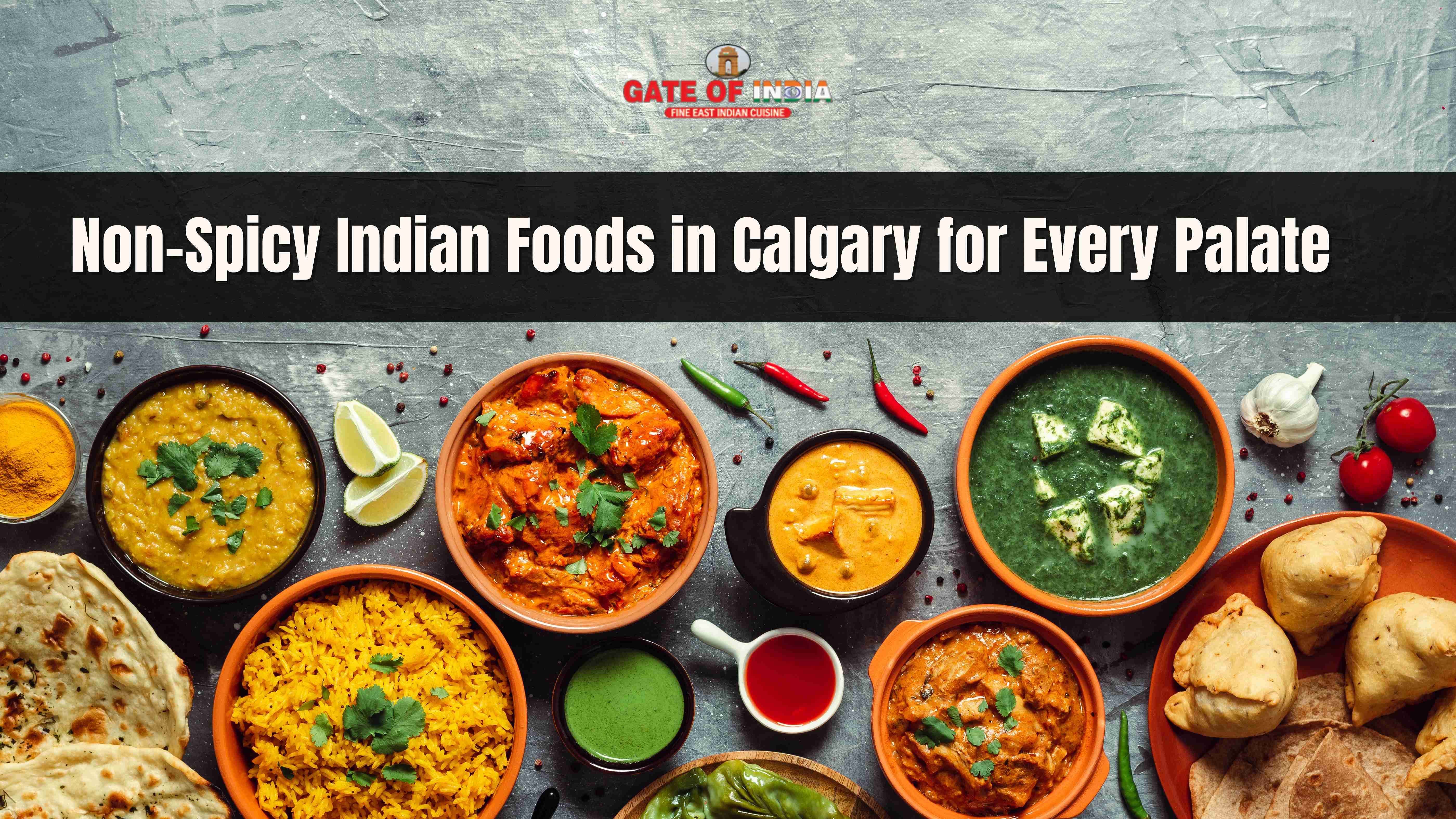 Non-spicy Indian food spread with curries, rice, naan, and samosas at Gate of India Calgary